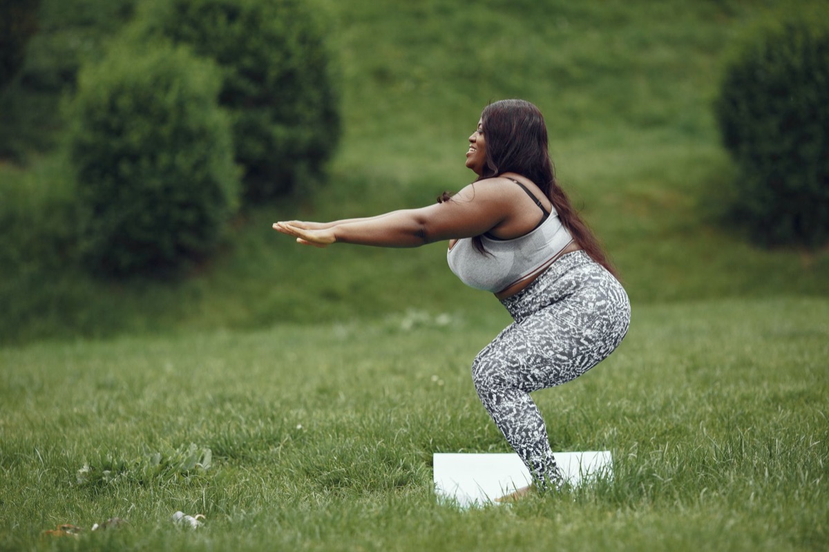 squatting person with hips too far back