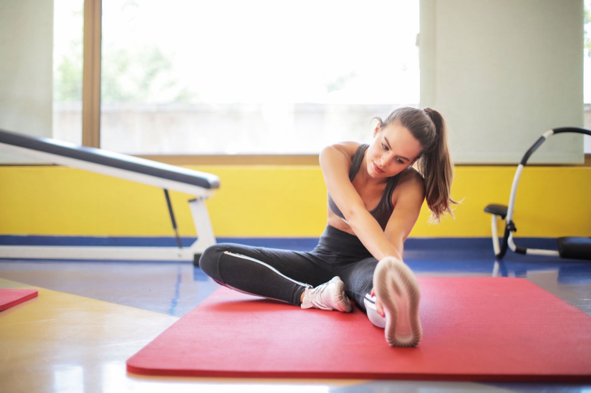 Yoga mat stretching with a person in a stretching position