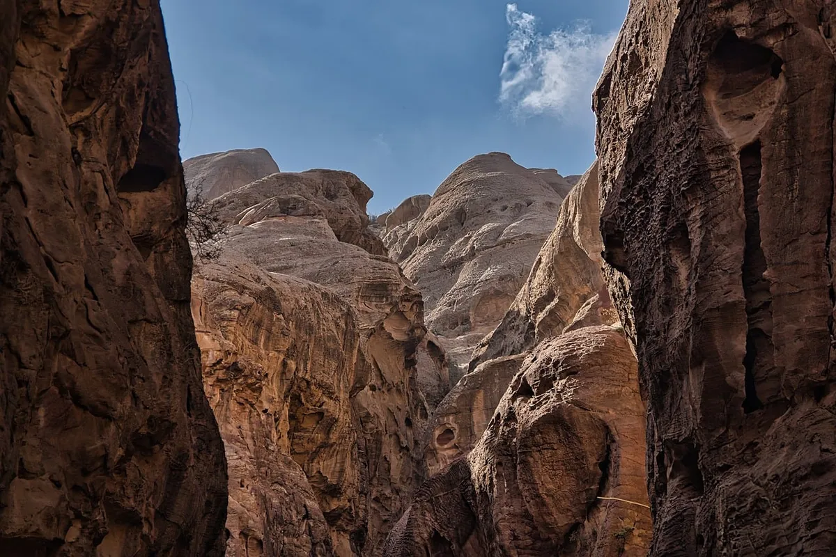 petra, jordan, canyon, sandstone, desert, travel, tourism, geology, erosion, nature, landmark, ancient, history, landscape, walls, pathway, narrow, exploration,